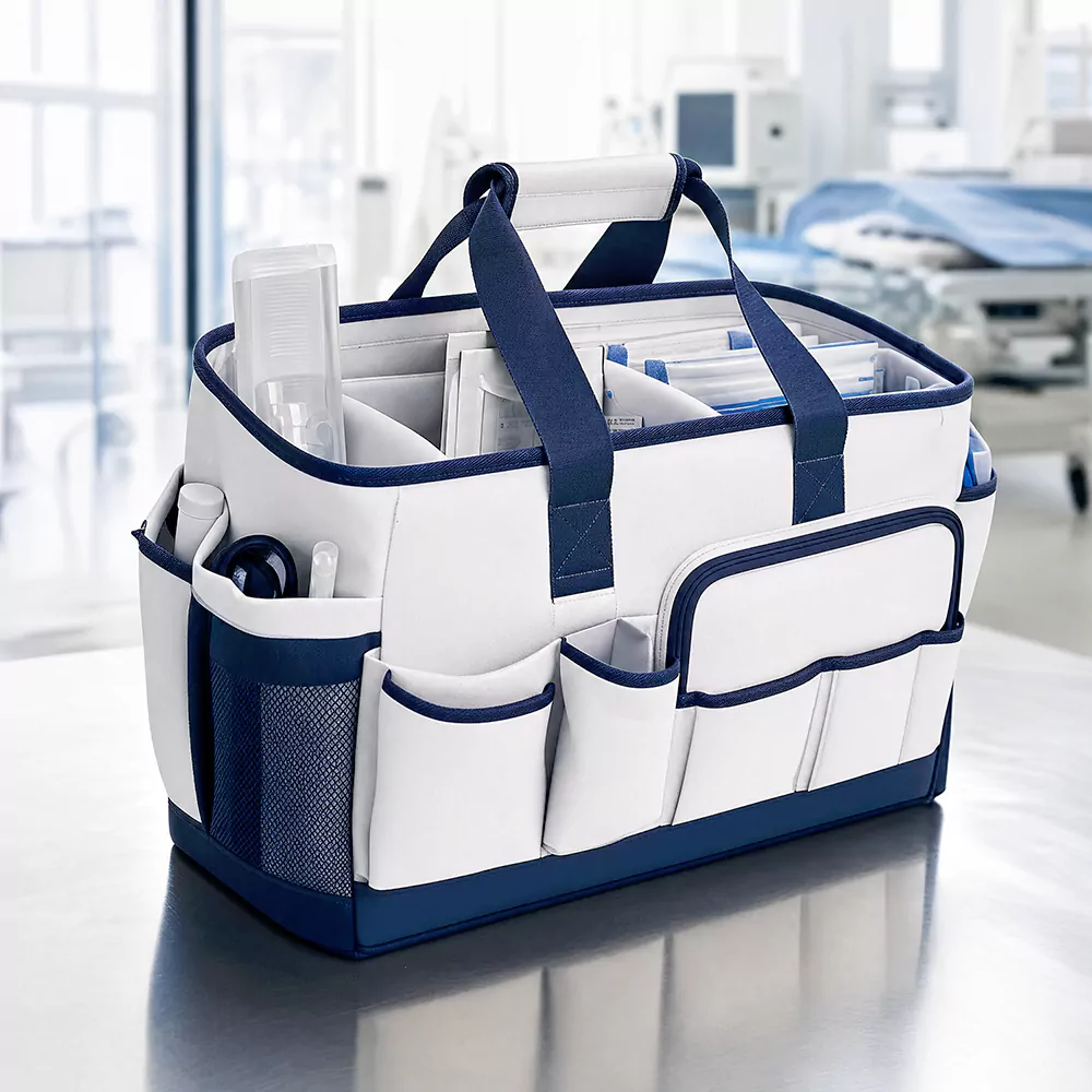 Healthcare storage bag with multiple compartments and easy cleaning surface