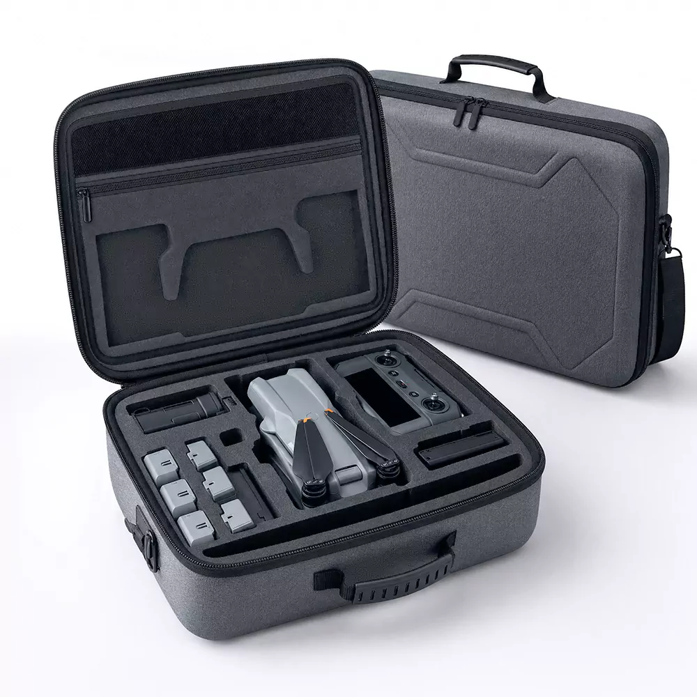 Drone and UAV carrying case with padded compartments and reinforced shell